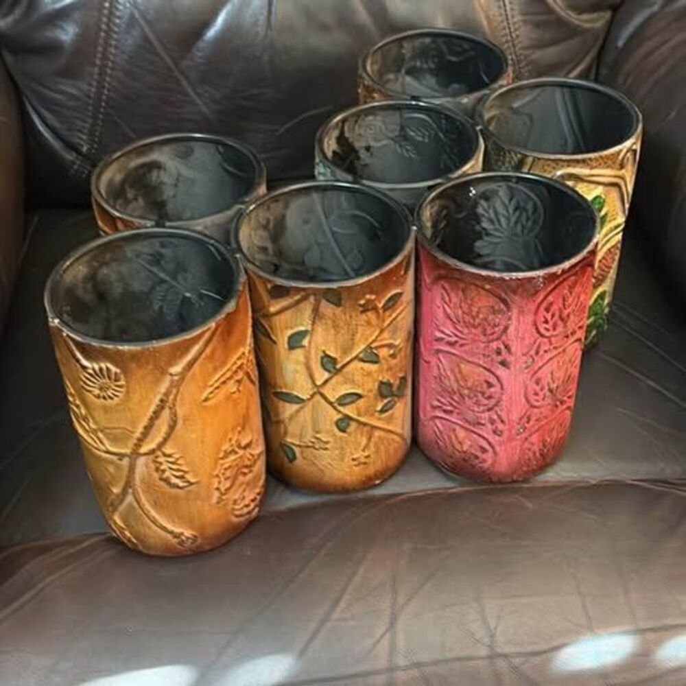 Set of 7 Embossed Metal Decorative Vases